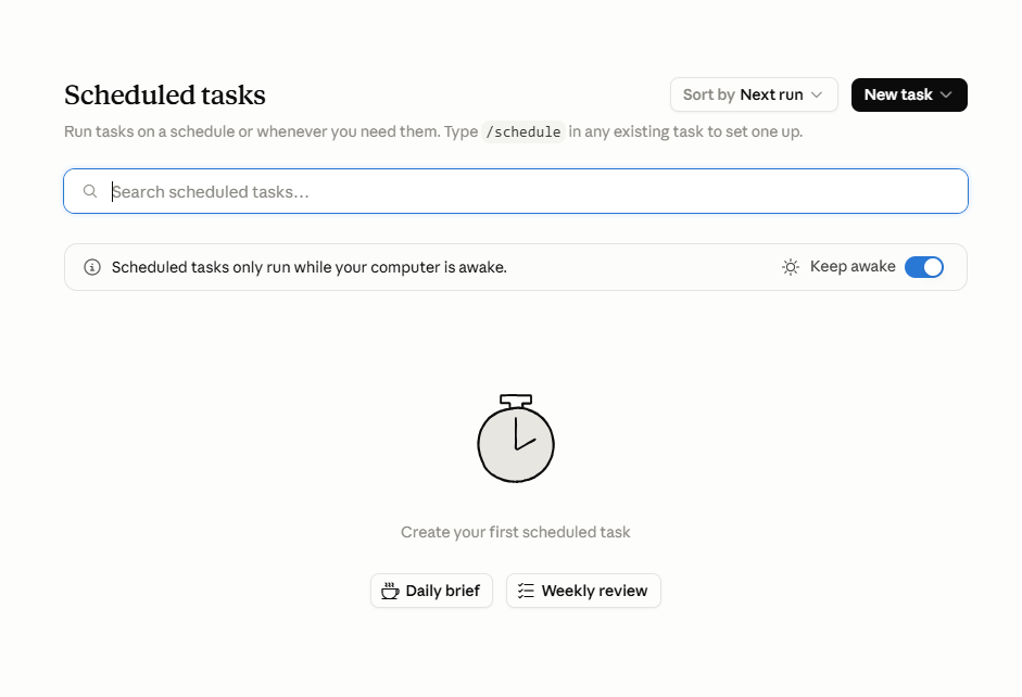 The Scheduled tasks screen, empty, with a search box, a New task button, a note that scheduled tasks only run while your computer is awake, and starter suggestions for a daily brief and a weekly review.